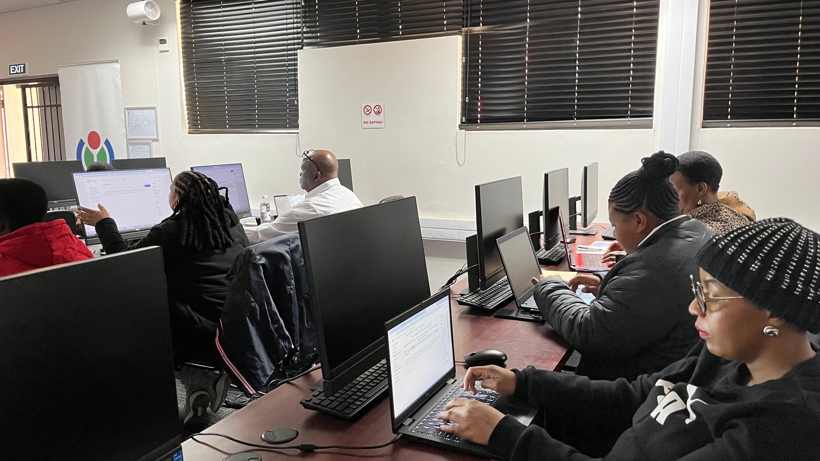 South African university students working together on campus